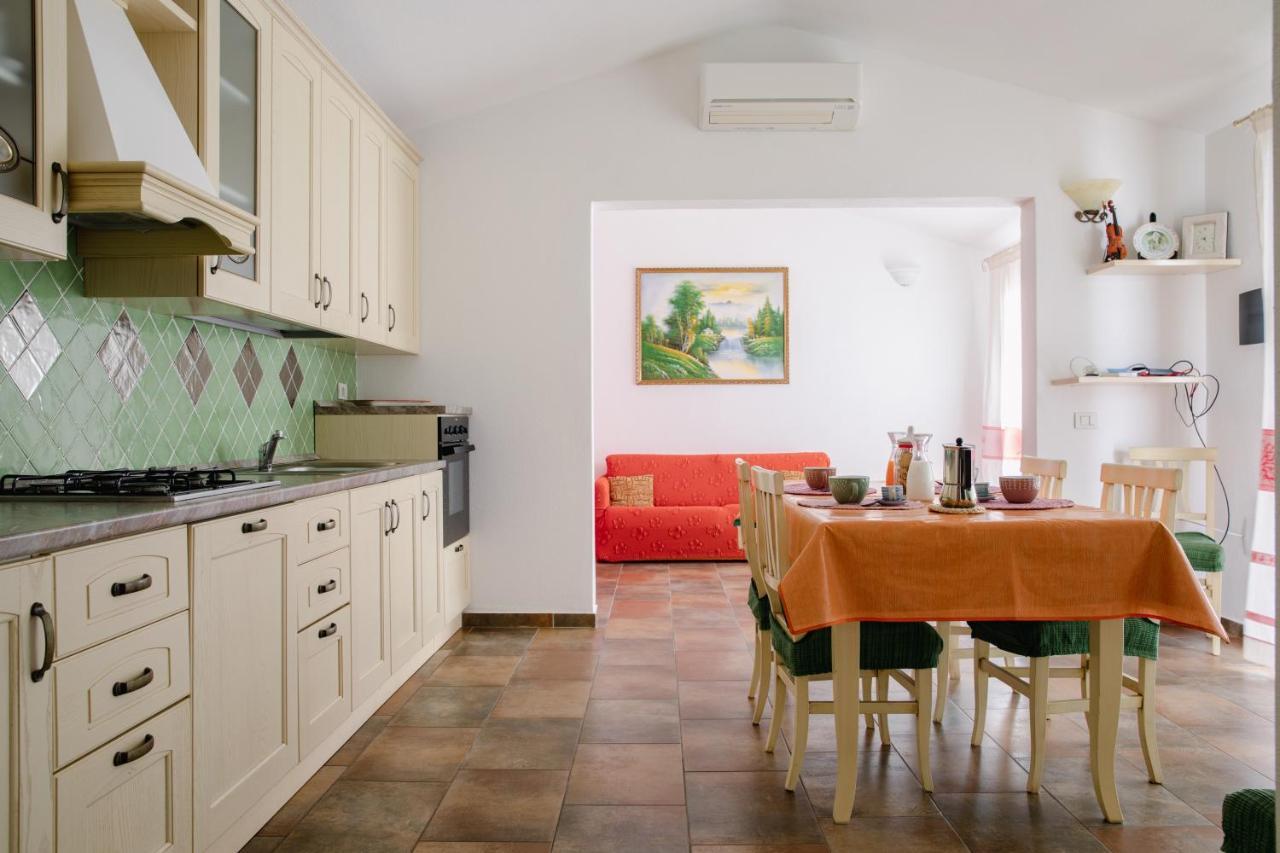 Le Residenze Di Baia Sant'Anna Tanaunella Exterior foto