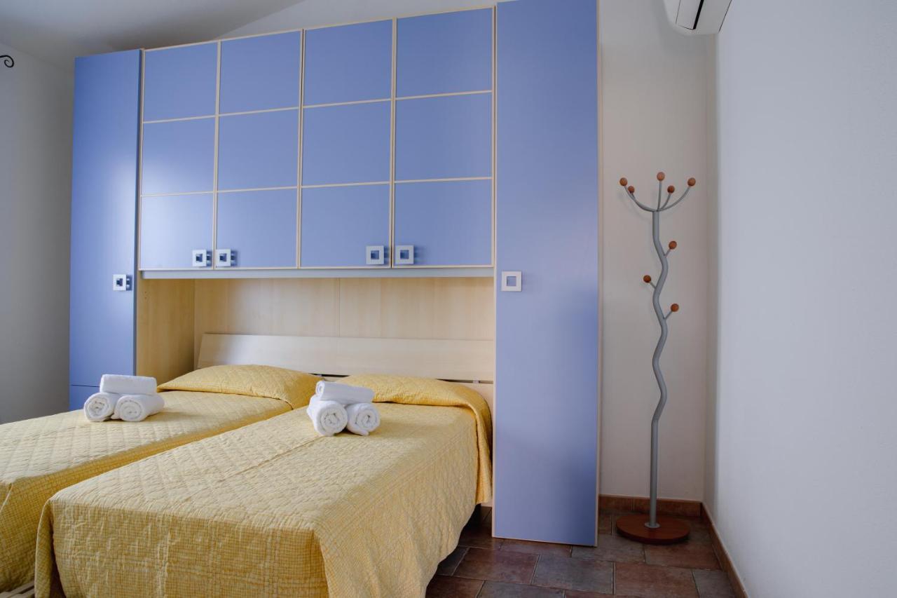 Le Residenze Di Baia Sant'Anna Tanaunella Exterior foto