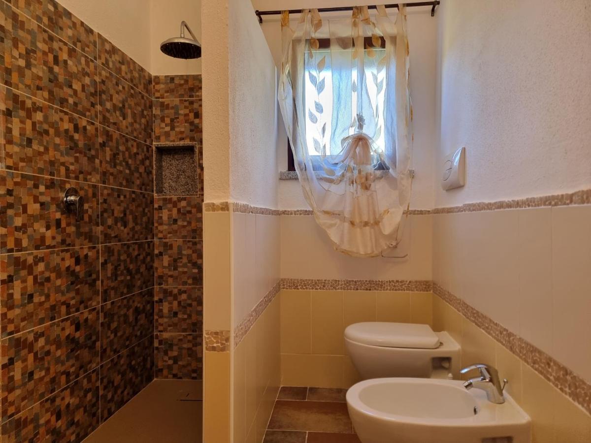 Le Residenze Di Baia Sant'Anna Tanaunella Exterior foto